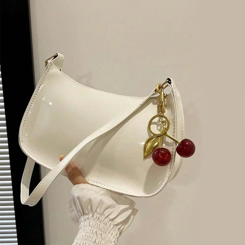 Women's PU Leather Handbag Versatile Fashion Solid Color Cherry Pendant Shoulder Bag Casual Commuting Bag Underarm Bag