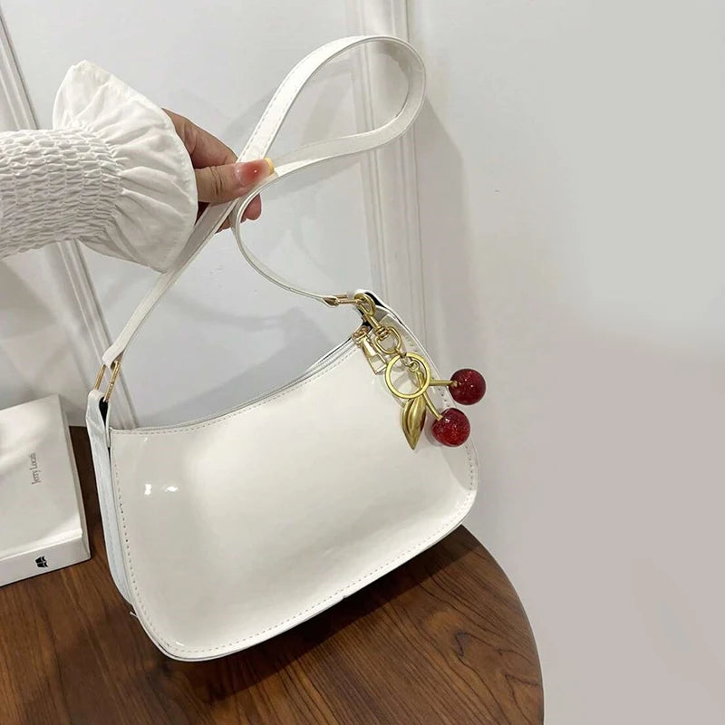Women's PU Leather Handbag Versatile Fashion Solid Color Cherry Pendant Shoulder Bag Casual Commuting Bag Underarm Bag