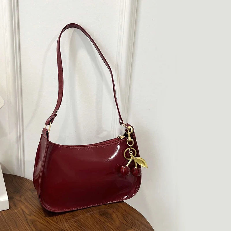 Women's PU Leather Handbag Versatile Fashion Solid Color Cherry Pendant Shoulder Bag Casual Commuting Bag Underarm Bag