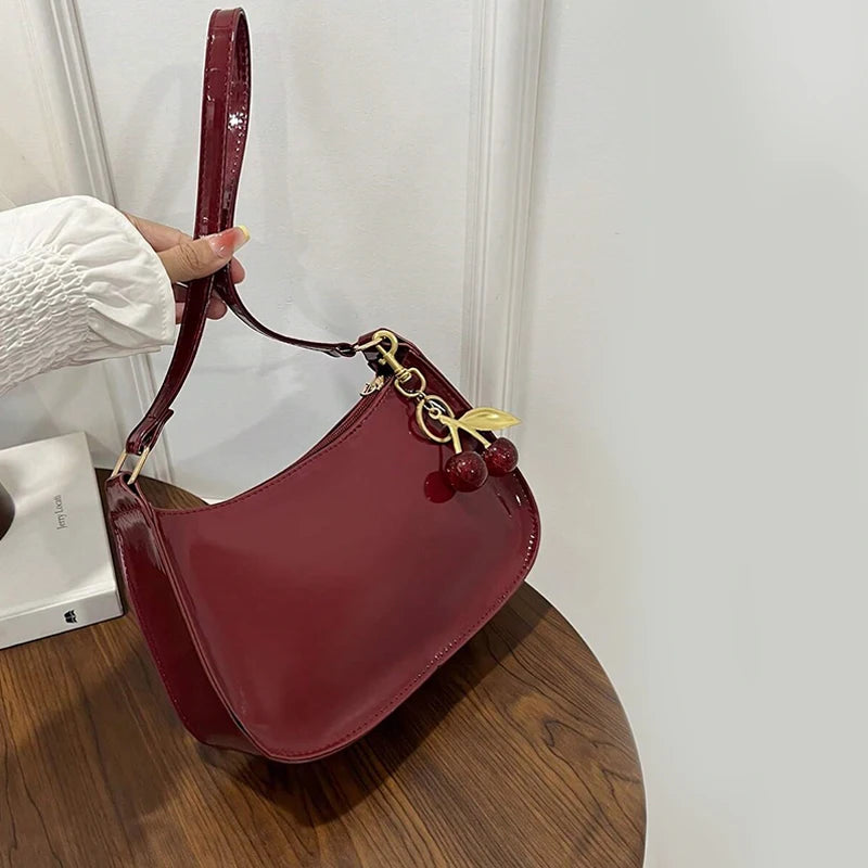 Women's PU Leather Handbag Versatile Fashion Solid Color Cherry Pendant Shoulder Bag Casual Commuting Bag Underarm Bag